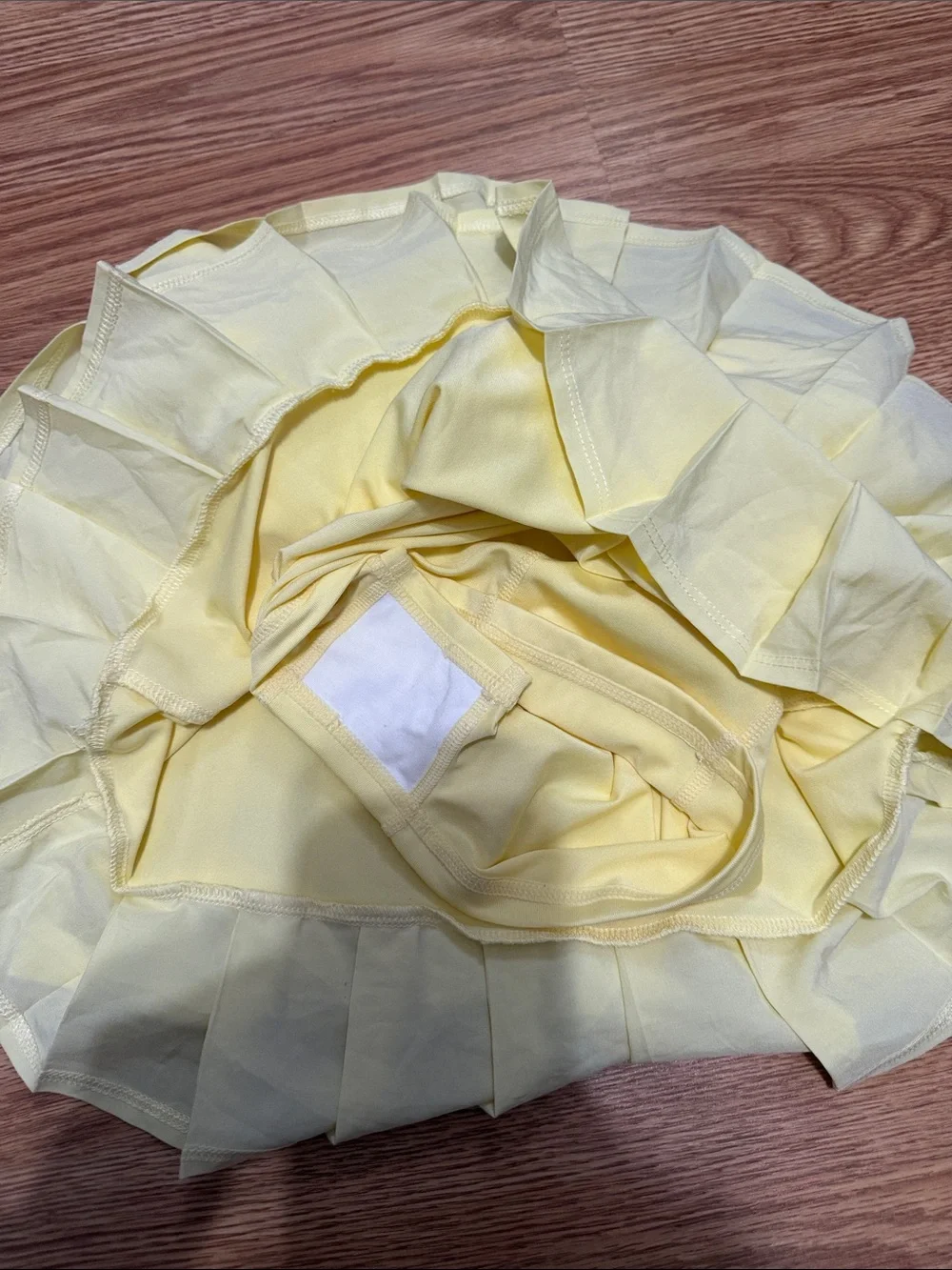 ALO Yoga Pleated Mini Skirt in Pale Yellow